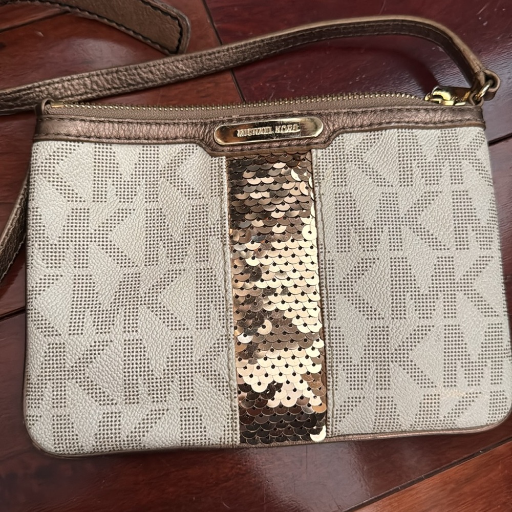 MICHAEL Michael Kors Small crossbody pouch with sequined center strip.